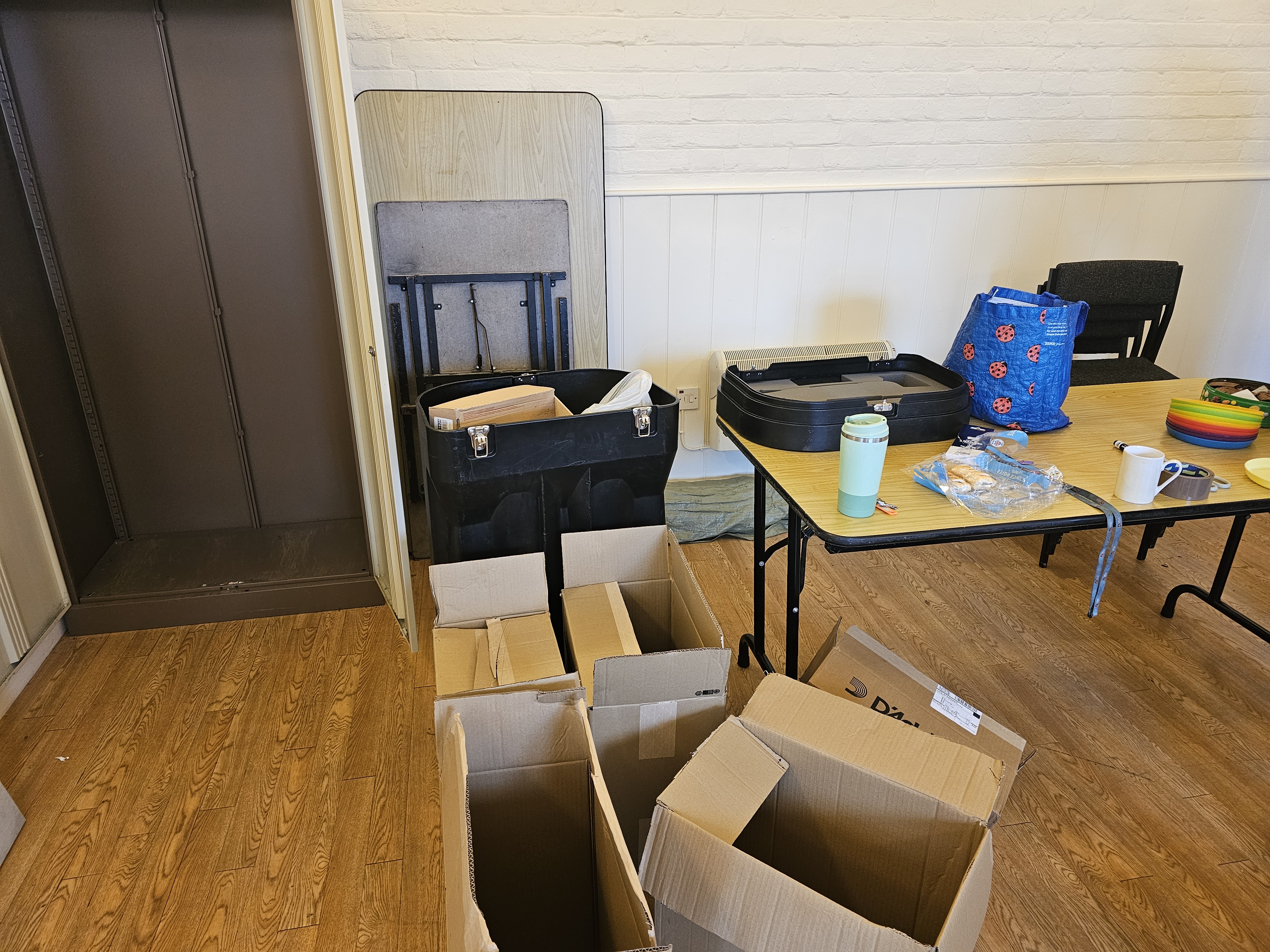 Instrument cases and boxes piled up during the move