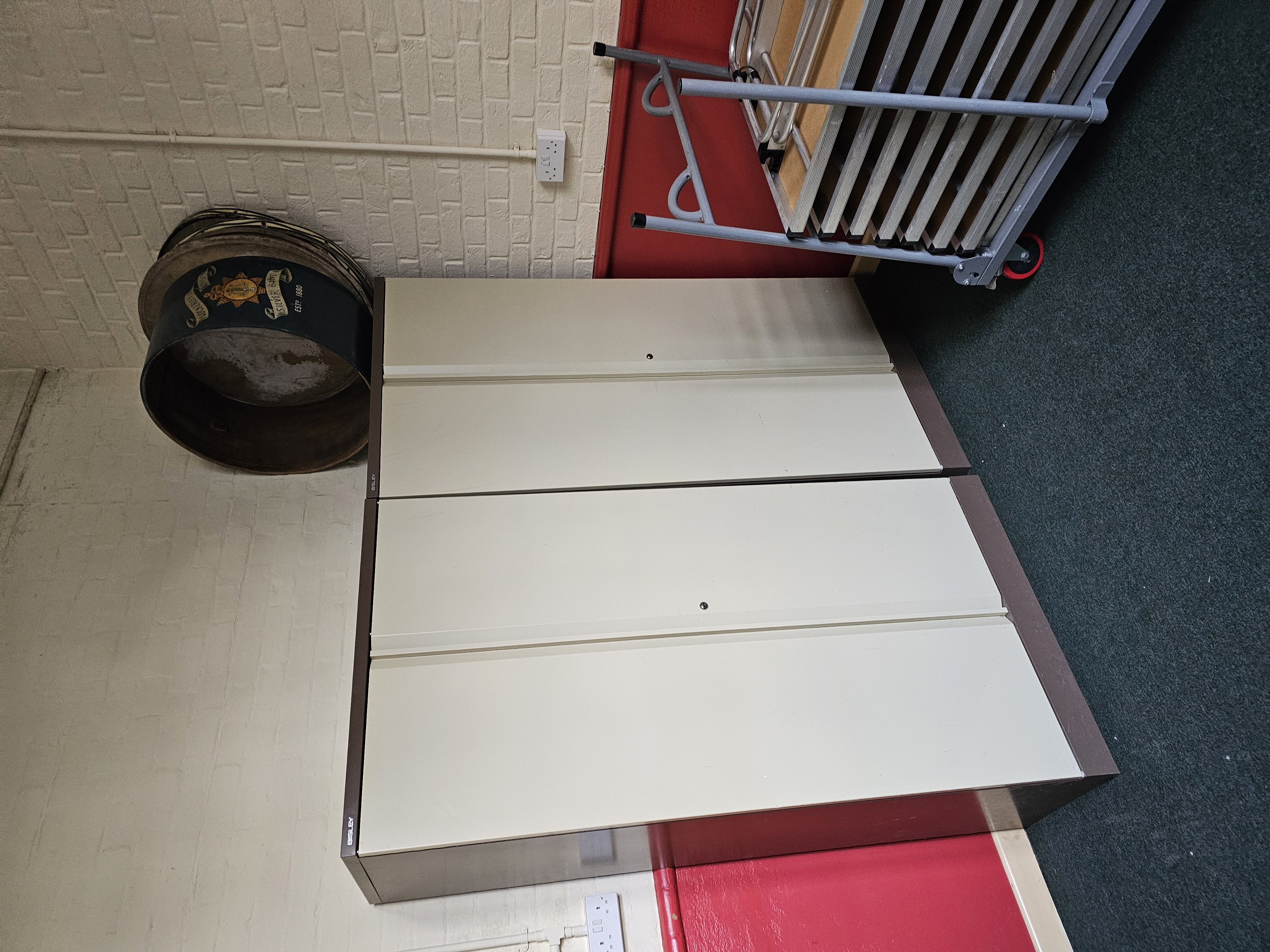 The band's historic drum and storage cabinets in the Parish Room